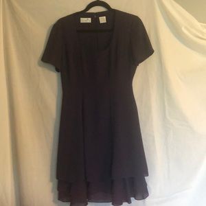 Deep purple flirty cocktail dress.